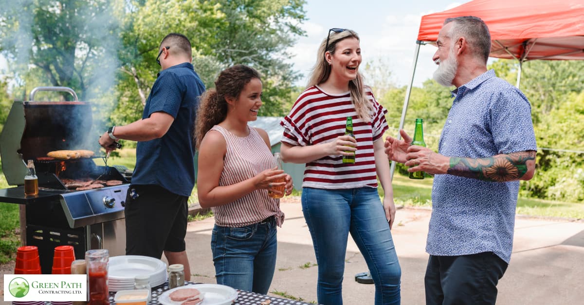 A group of neighbors standing in front of their laneway house and socializing